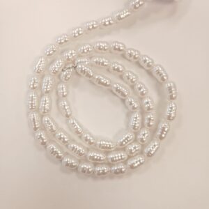 פנינים פלסטיק באיכות גבוהה אוקולון מאורכות 7X6  מ"מ