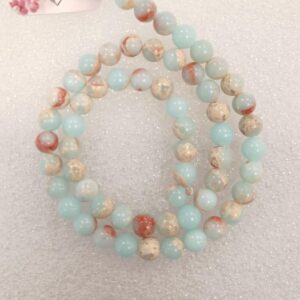 אבנים טבעיות ג'ספר גוון תכלת מעורב בצבעים נוספים